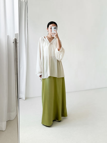 寬鬆束口袖透膚上衣 米色